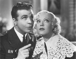 Di ck Powell with Marion in PAGE MISS GLORY, 1935